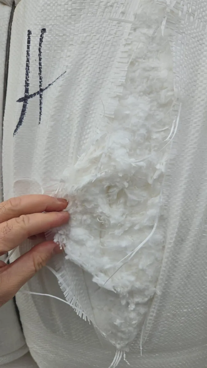 Opened bale revealing the bright white bleached fiber