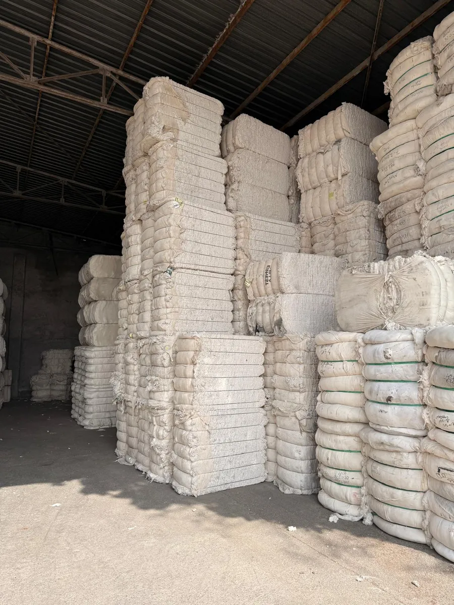 Cotton waste bales stacked in the warehouse